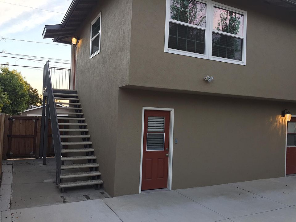 Upstairs unit as seen from the private yard.