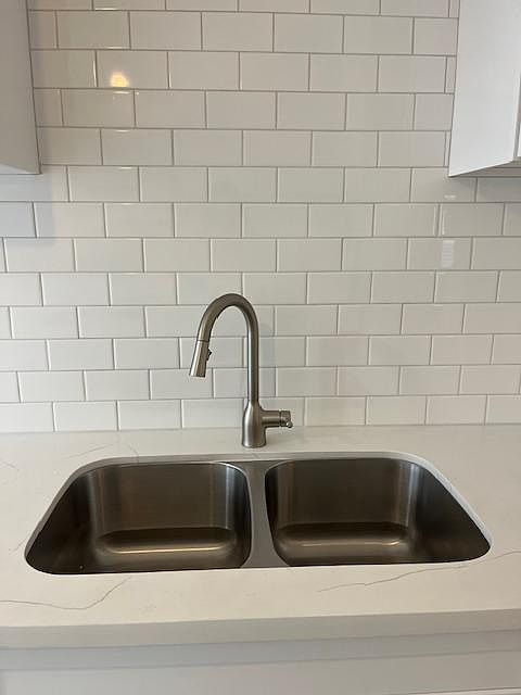Kitchen sink with marble countertops