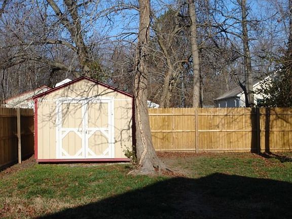 fenced yard with shed