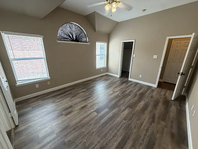 Primary bedroom with new floor.