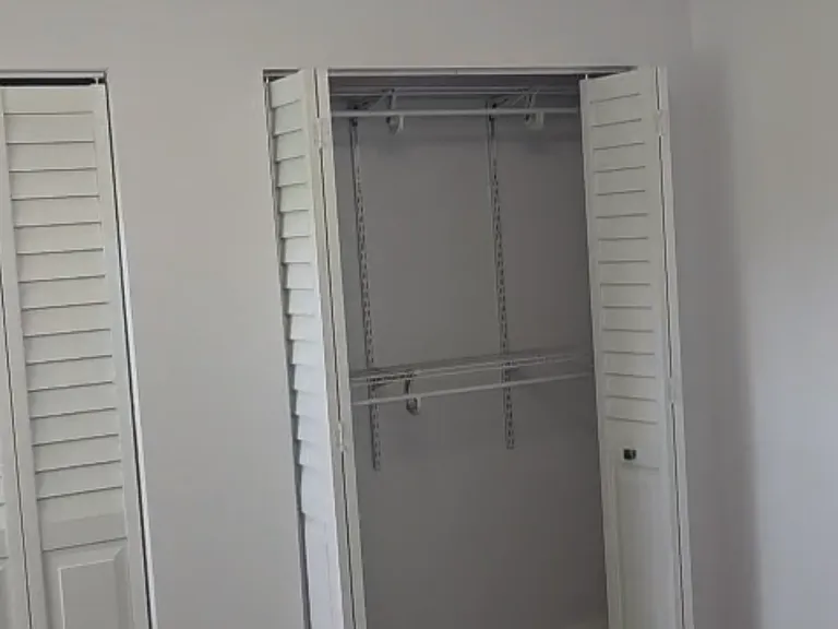 Ceiling Fan with light and Remote Control, Walkin Closet - This is the Master which has 3 closets. Closet System is Brand New