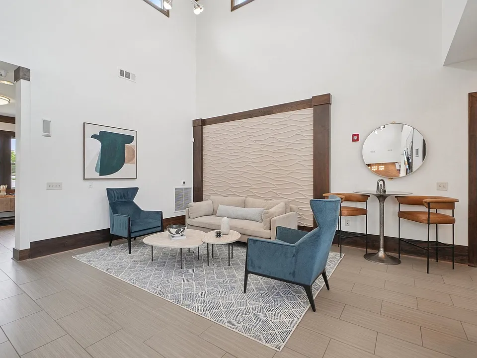 Comfortable resident lounge and gathering spaces at Village at Broadstone Station apartments in Apex, North Carolina
