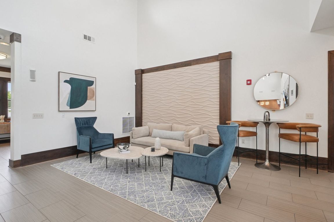 Comfortable resident lounge and gathering spaces at Village at Broadstone Station apartments in Apex, North Carolina