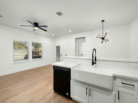 Includes dishwasher and large farm house style sink
