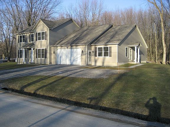 Exterior front, Main house and in-law both have covered private entrances.