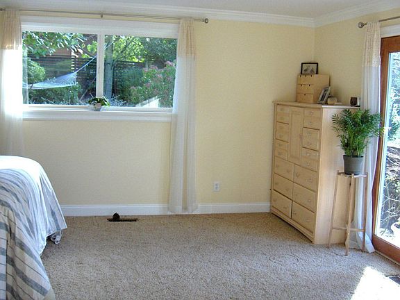 HUGE master bedroom w/ French doors to patio, w/i closet & .75 travertine bath