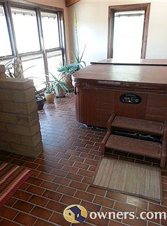 The Foyer with full length windows and 2 skylights