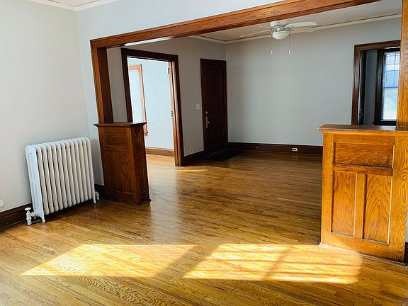 from dining room looking into living room and sunroom