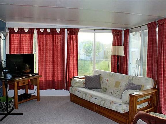 Sun Room. 3 SEASON SUNROOM ACCESSED FROM GREAT ROOM.