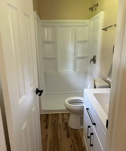 Primary ensuite bathroom with walk in shower.