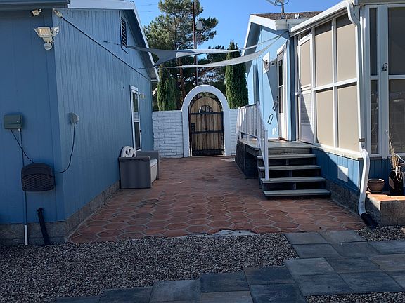 Patio between house garage 