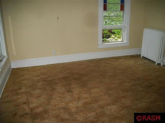 2nd image of 210 E 2nd St