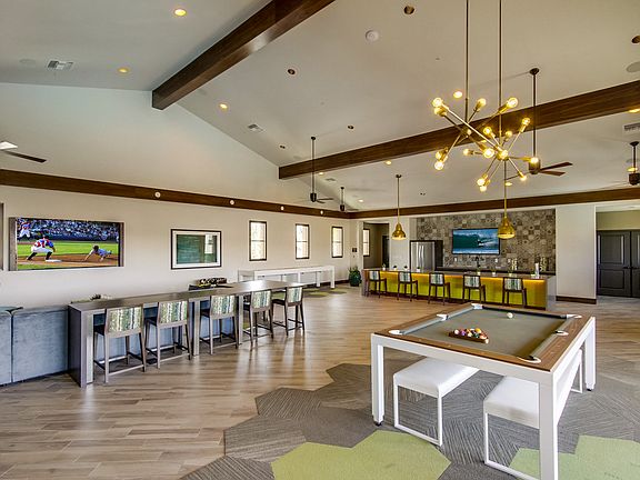 Enjoy the game, cook for friends and family, or play some billiards