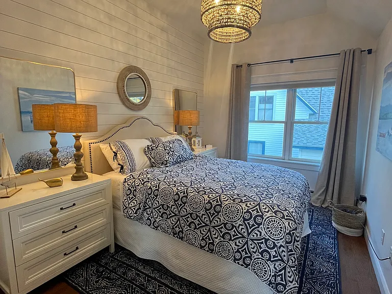 New mirrors and brand new Serena and Lily rug added 10/28/25. Photo taken at dusk.