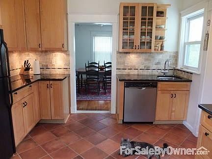 Remodeled kitchen : Granite countertop, ceramic tile