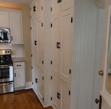 Original restored cupboards in kitchen
