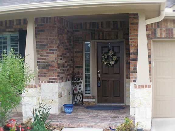 Welcoming front porch. There is room for a swing.