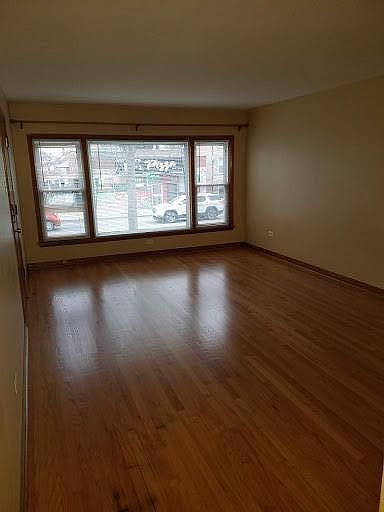 Large living room with Hard wood floors!