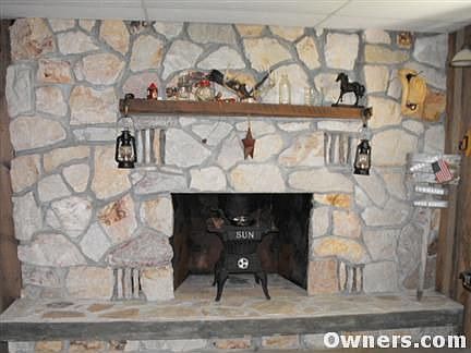stone fireplace in basement