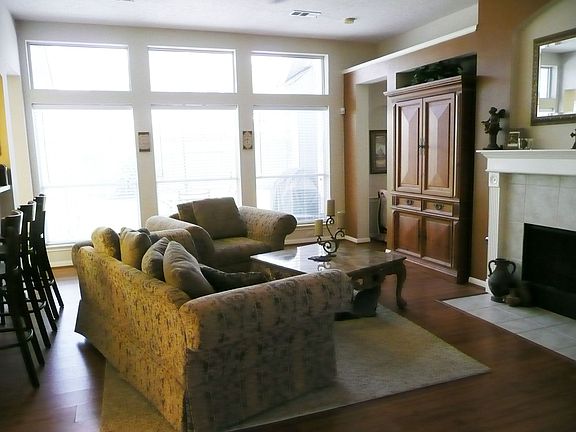 Family room with wood floors