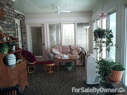 Beautiful sunporch
						:
						Beautiful sunporch with Pella windows on 3 sides