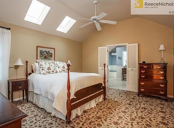 Spacious First Floor Master Bedroom with Skylights, Artistic Carpeting and Large Walk-in Closet.