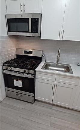 5th image of 7435 Byron Ave #1
