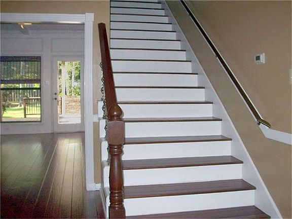 Formal dining with half paneling.