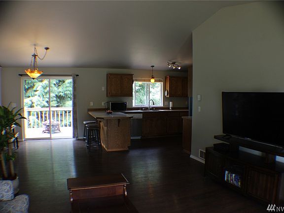 Lots of cabinets with the laundry room right off the kitchen for convenience!