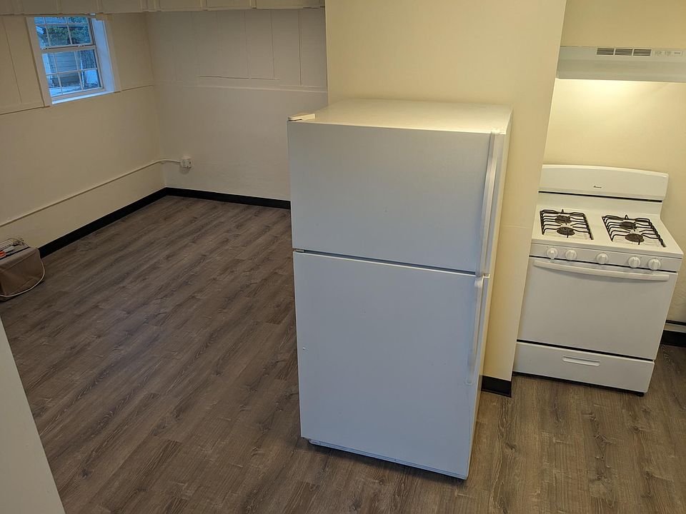 Studio area to the left of kitchen.