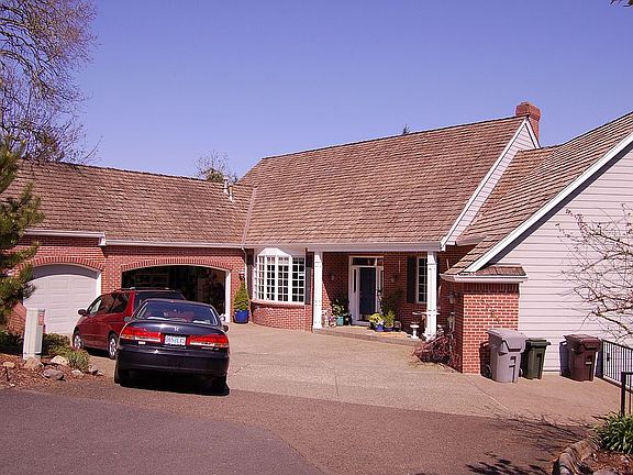Front of house (roof since replaced with solar reflective composite)
