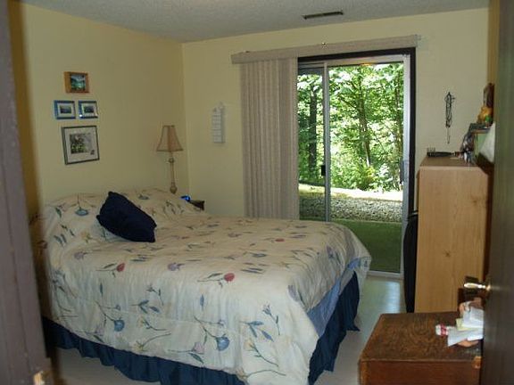 each bedroom has slider to covered patio