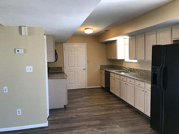 Kitchen remodeled! New floor, newer cabinets & appliances. P