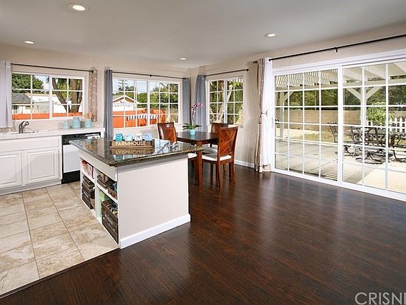 The dining area fittingly adjoins the kitchen and with its easy access to the backyard it is perfect for serving and entertaining your guess simultaneously.