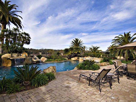 A private 1.6-acre lot with a 1.5-acre private park next door.