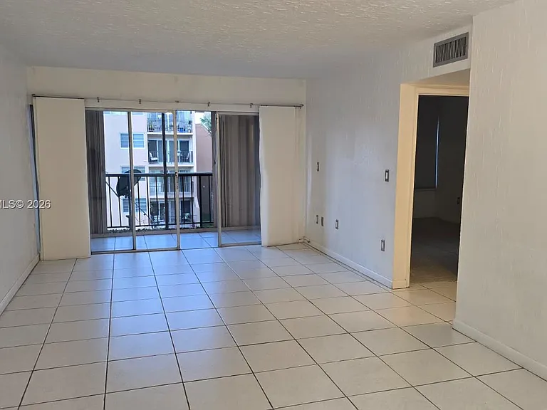 702 NW 87th Ave #309 — Photo 2