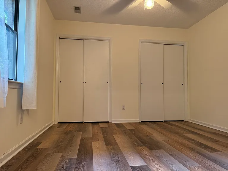 Main bedroom wall of closet space