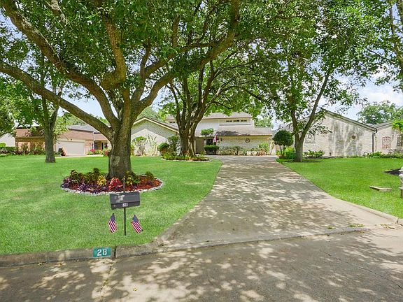 Brick Exterior, 2 car garage w/ a long driveway for additional parking!