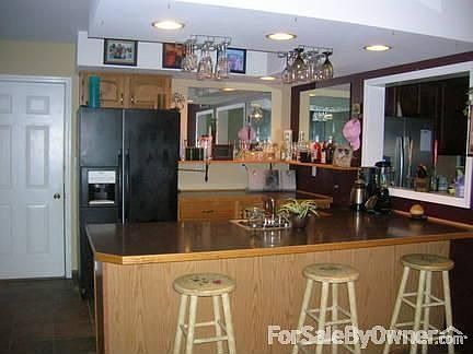 Bar Area
						:
						Bar includes 2nd refrigerator, 2nd dishwasher, a bar sink, and lazy susan.
