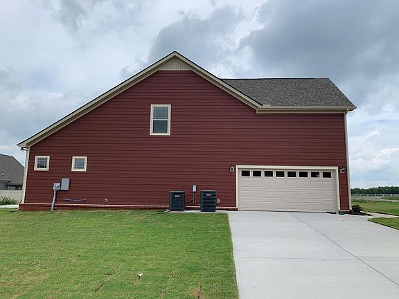 side view of side entry garage on corner lot.
