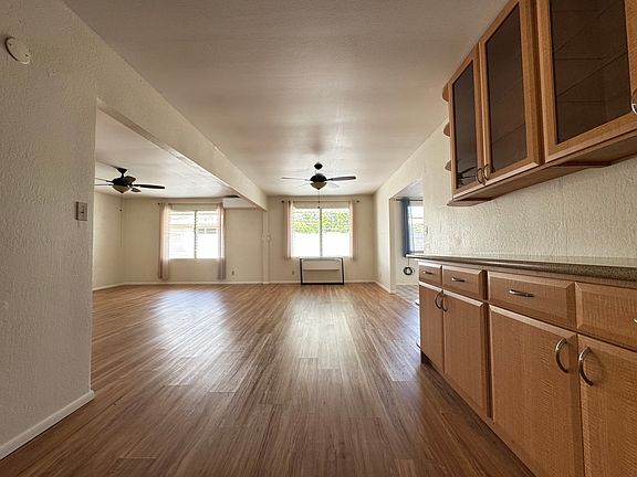 Right, rear is area that can be divided into a 4th room.