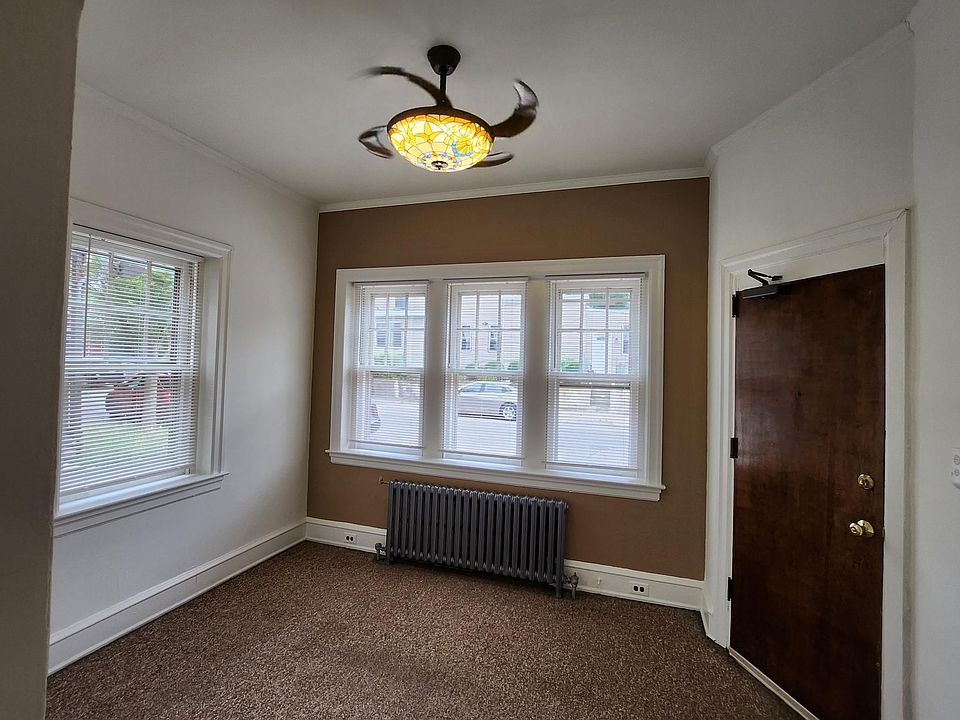 Living Room with Ceiling Fan and Light