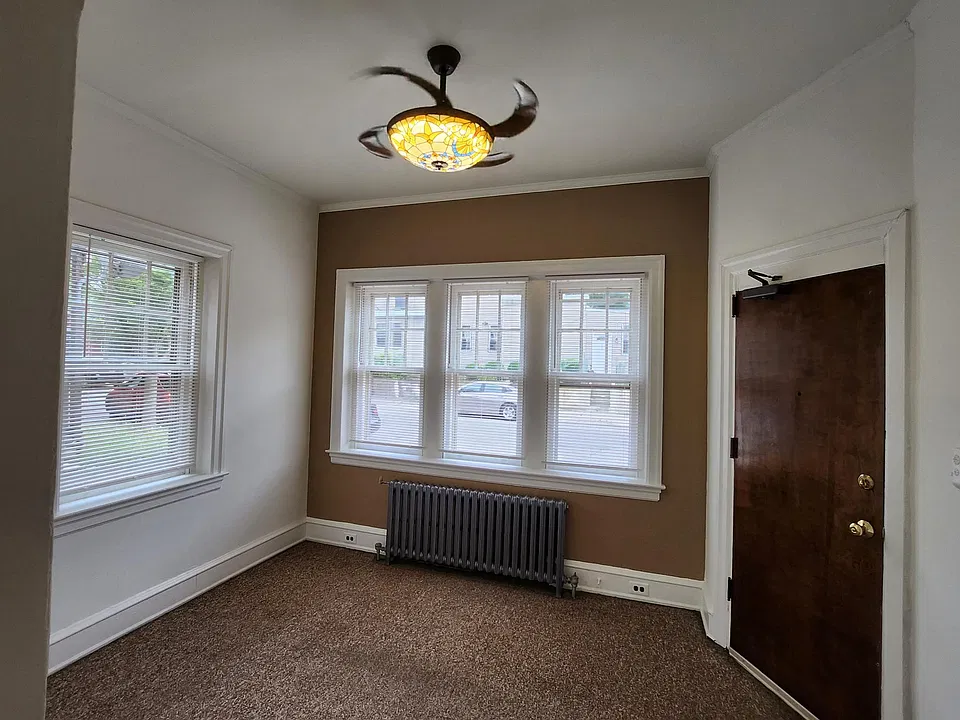 Living Room with Ceiling Fan and Light