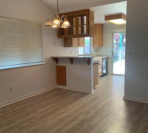 Closer look at where table would go. Bar for up to 3 stools. Lots of cupboard space