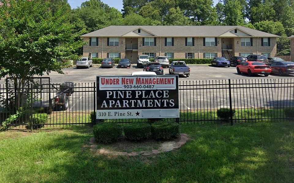 Our sign and looking into the gate at our apartment complex.