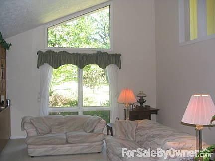 Living Room
						:
						Vaulted ceiling, gas vent free fireplace, built-in bookshelves