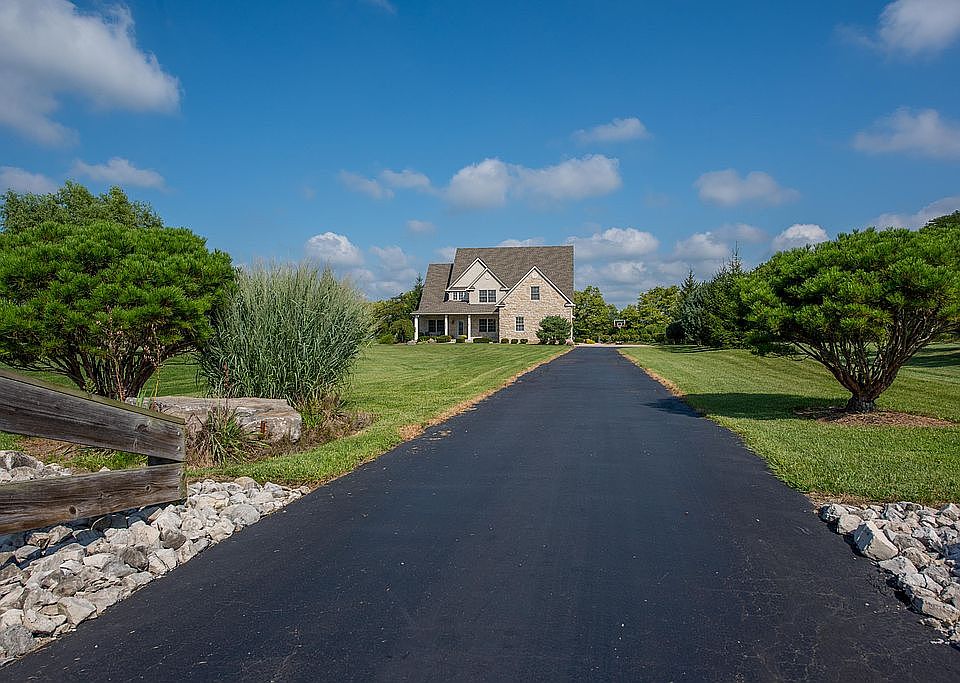 Set 250' back from this road