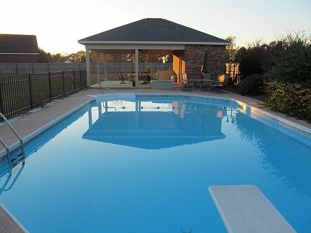 Pavilion has bathroom and single garage for storage.