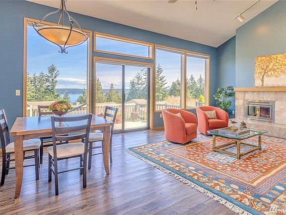 As you turn in the living room towards the view.  Fireplace to the right is wood.