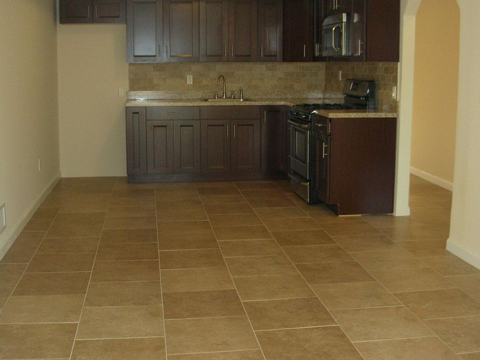 open concept living room kitchen dining area